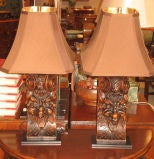 Pair of Carved Wooden Lamps  Mask Faces