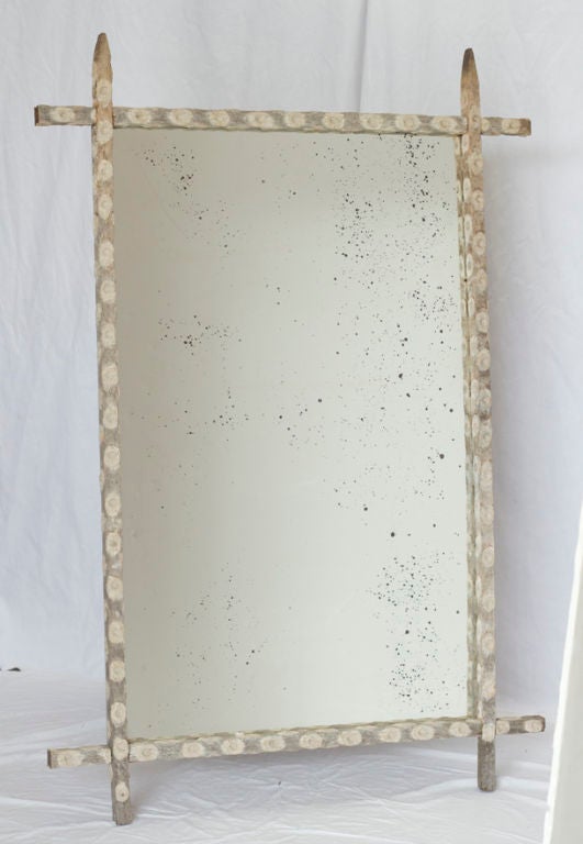 A handsome mirror made from old oyster sticks.