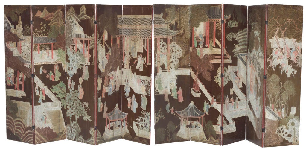 A wonderful faded cognac  colored coromandel screen made in China during the 19th century.