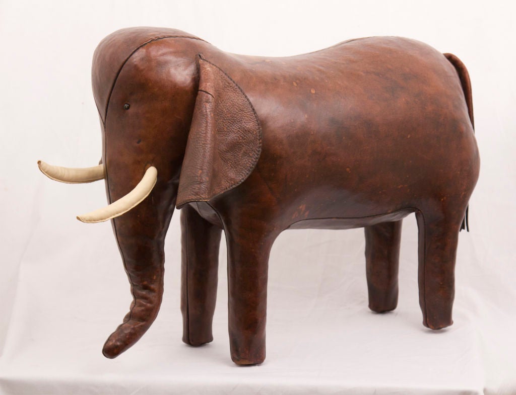 A great vintage elephant stool / bench in leather.  Made by Abercrombie &  Fitch.