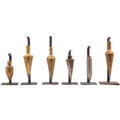 Collection of mounted  Plumb Bobs