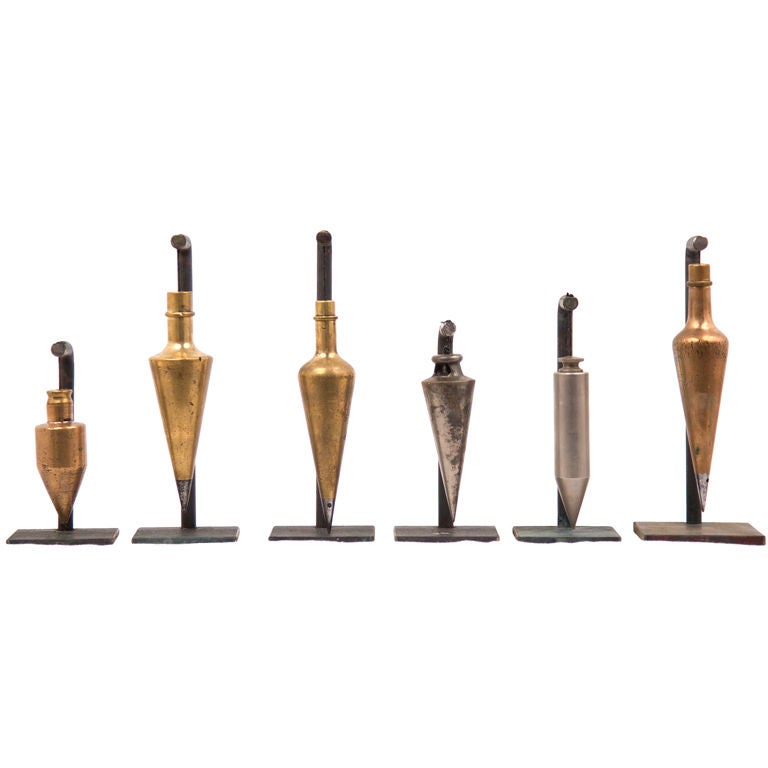 Collection of mounted  Plumb Bobs