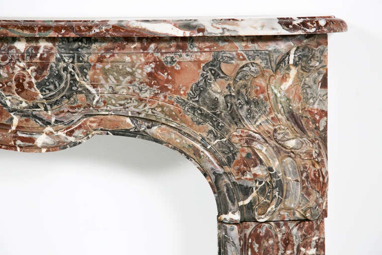 A Classic large-scale French Rouge Royal marble fireplace surround made in the late 19th or early 20th with good carving and great color. From the inventory of one of San Francisco's most famous (now closed) antiques stores.