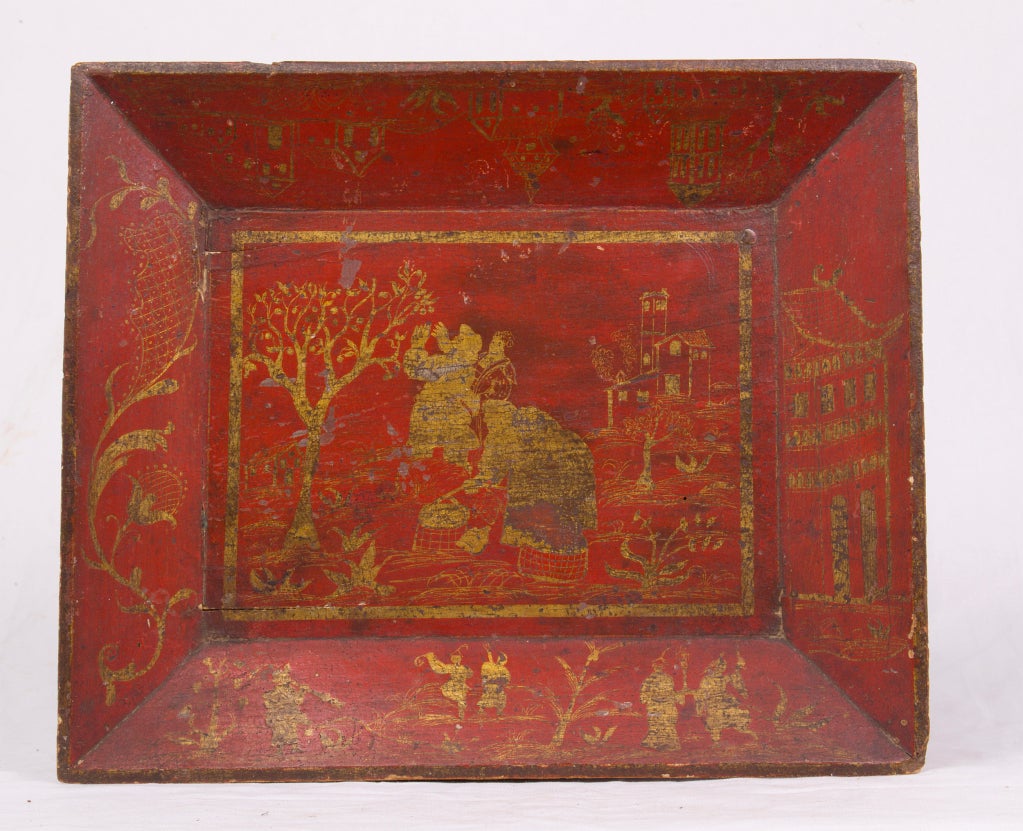 Red ground with gold chinoiserie decoration.