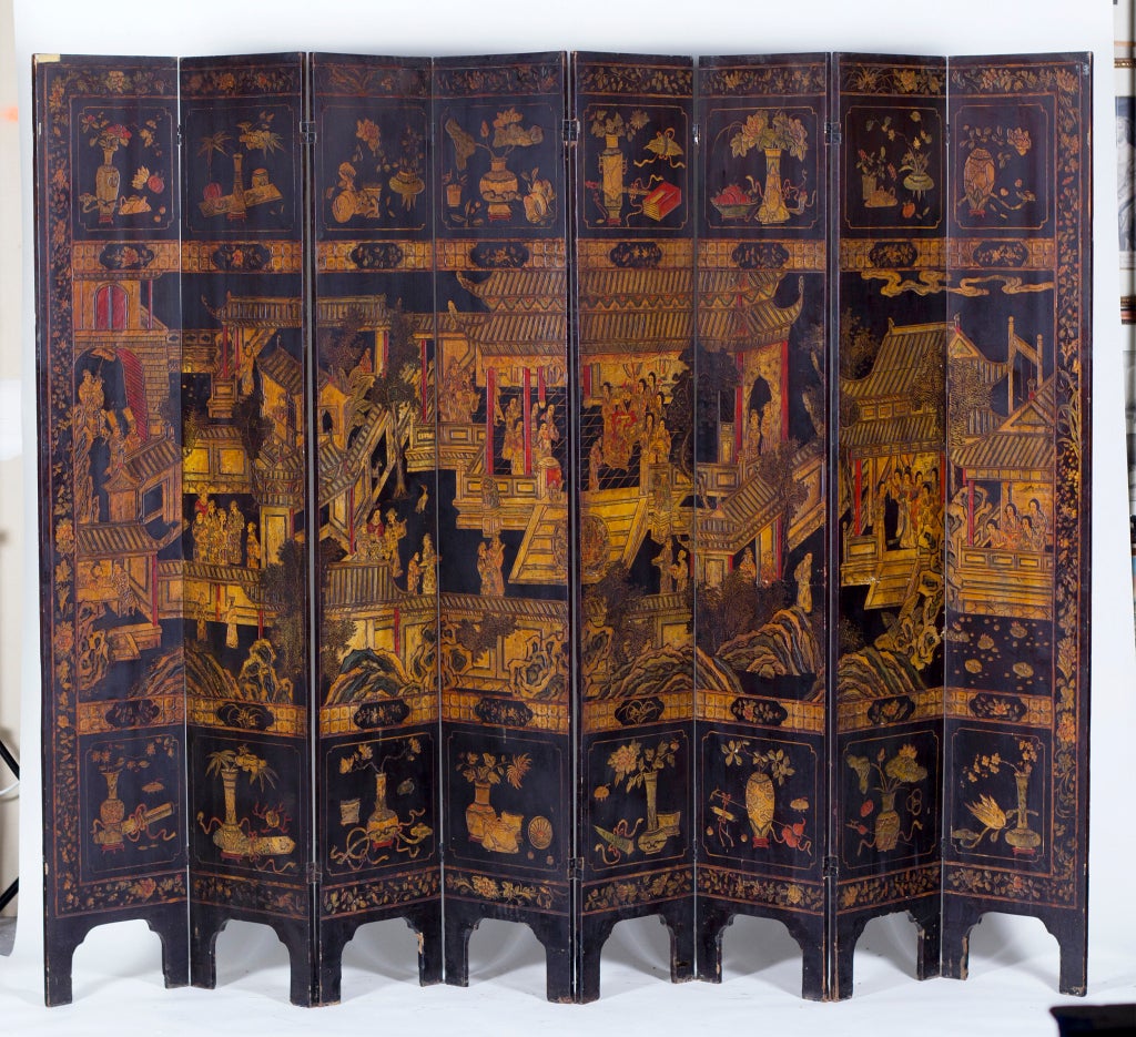 Old Chinese carved lacquered  Coromandel screen made during the 19th century.  Classic decoration featuring a royal pavilion with aristocrats at leisure.  The reverse decorated with panels of landscapes, panels of scholars objects, and panels of