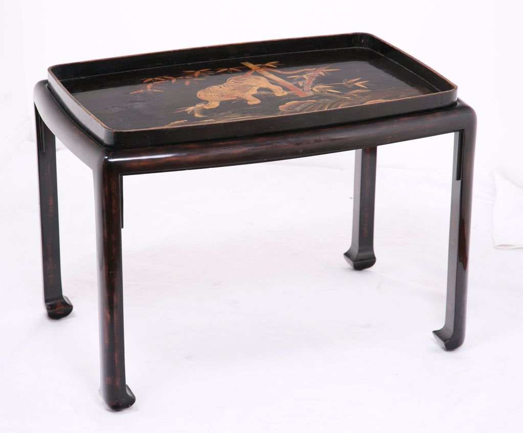 A very beautiful Meiji period Lacquered tray featuring a tiger in a bamboo grove.  The stand is custom and a later addition.   The tray has some rubbing to gilt as expected.  Overall nice condition. c.1900