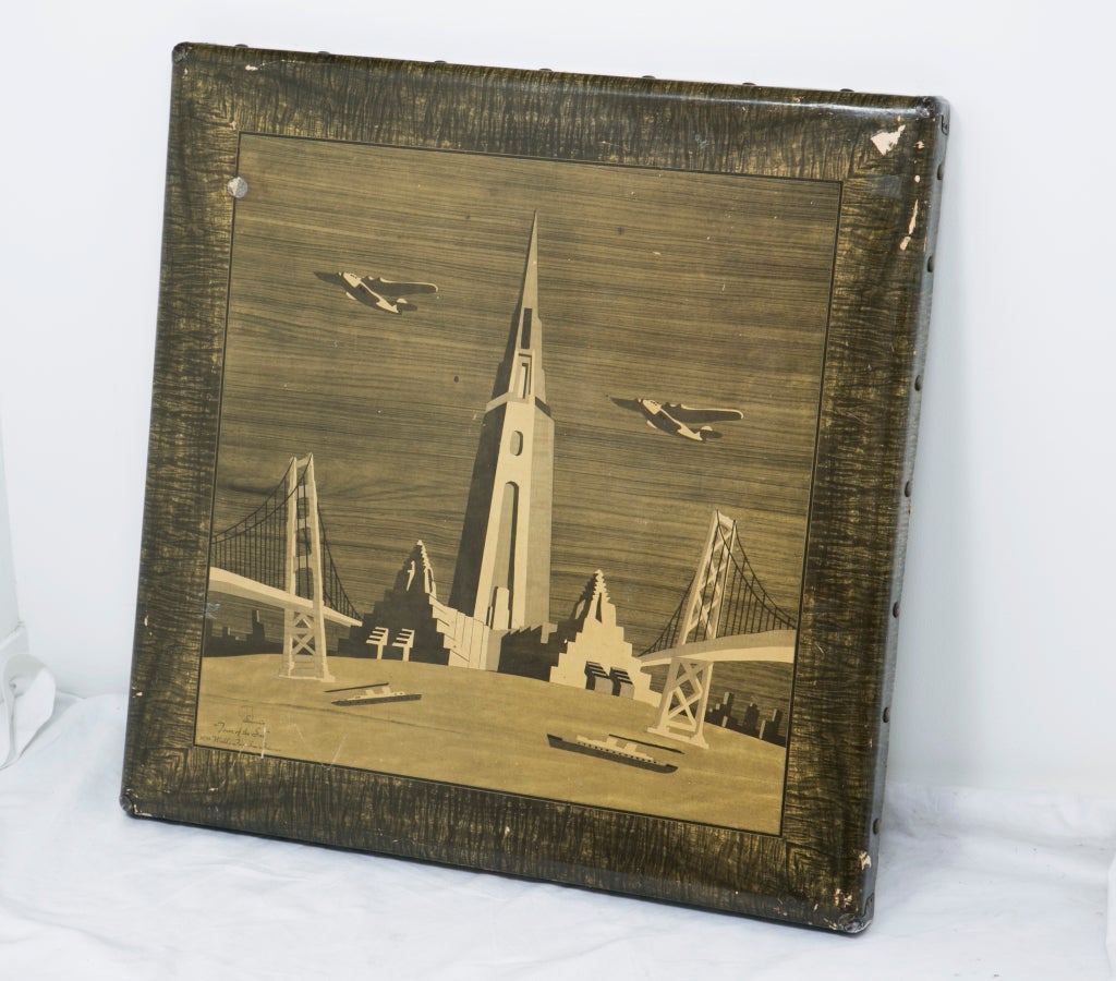 A wonderful Souvenir form the Treasure Island Worlds Fair 1939-1940.  The table is solid and decorated with stylized views of the new Bay Bridge, the Worlds Fair and airplanes.  We can have the surface touched up so that the wear is less obvious.  