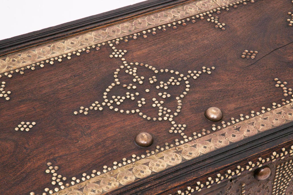 These elaborately brass decorated hardwood trunks are generally thought to come form Zanzibar or the Northern Coast of Kenya.  Great decoration and very scarce.  These make fantastic coffee tables.  Also a good at the foot of a bed for storage or