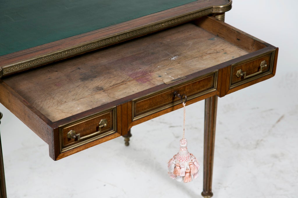 A wonderful delicate 19th Century French Louis XVI Style writing table with gilt bronze mounts. Circa 1870