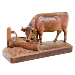 Antique Carved Wooden Cow at Trough