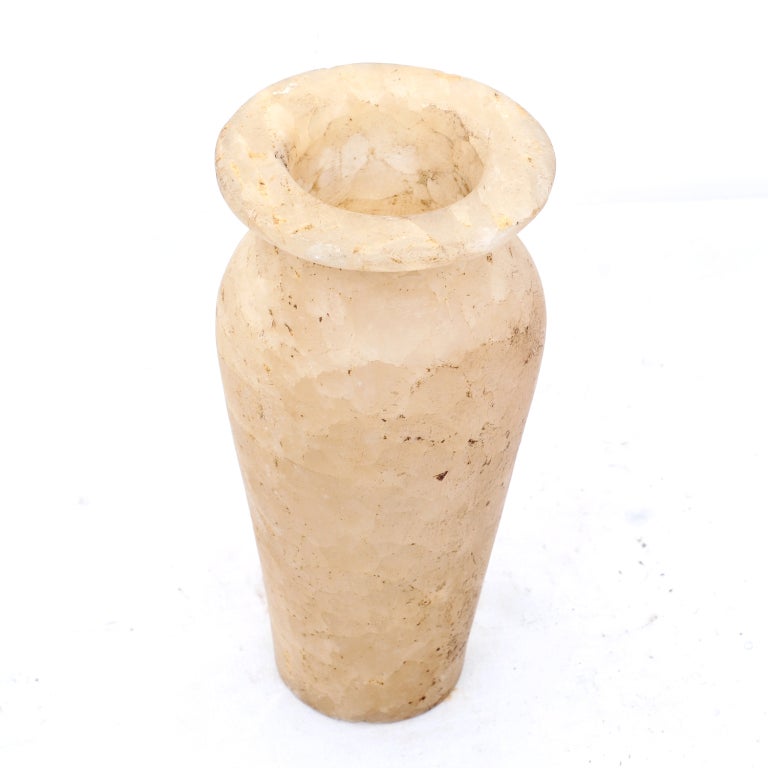 A large and handsome Egyptian alabaster vase / container in the ancient style.  We think this piece was made early in the 20th century for sale to wealthy tourists visiting Egypt.  This comes from a large collection assembled in New York between