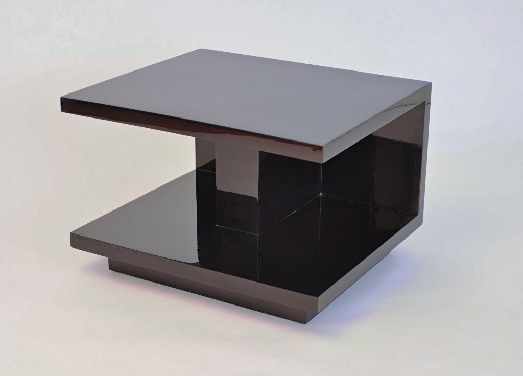A pair of large-scale end tables from Van Keppel and Green. These large end tables were introduced before WW2 by the design team in Southern California. The architectural form gives a strong nod to Neutra's furniture designs. Ebonized in a deep rich