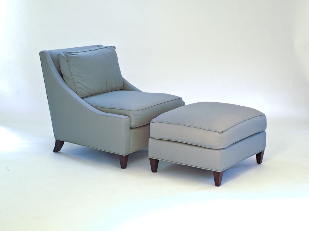 Ms. Barry's curved back lounge chair and ottoman. Handsomely proportioned and comfortable arm height is 15