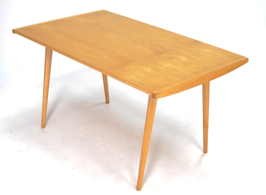 A solid birch writing table from the limited Knoll line by furniture master George Nakashima.