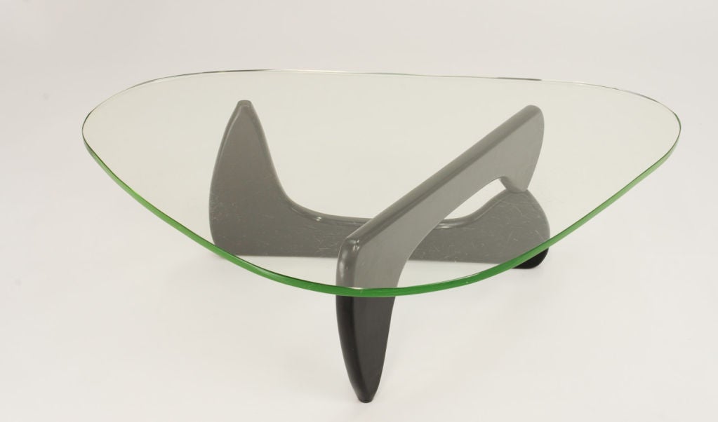 Isamhu Noguchi's coffee table for Herman Miller, model IN-50.  The green glass was only offered in the first few years of production.