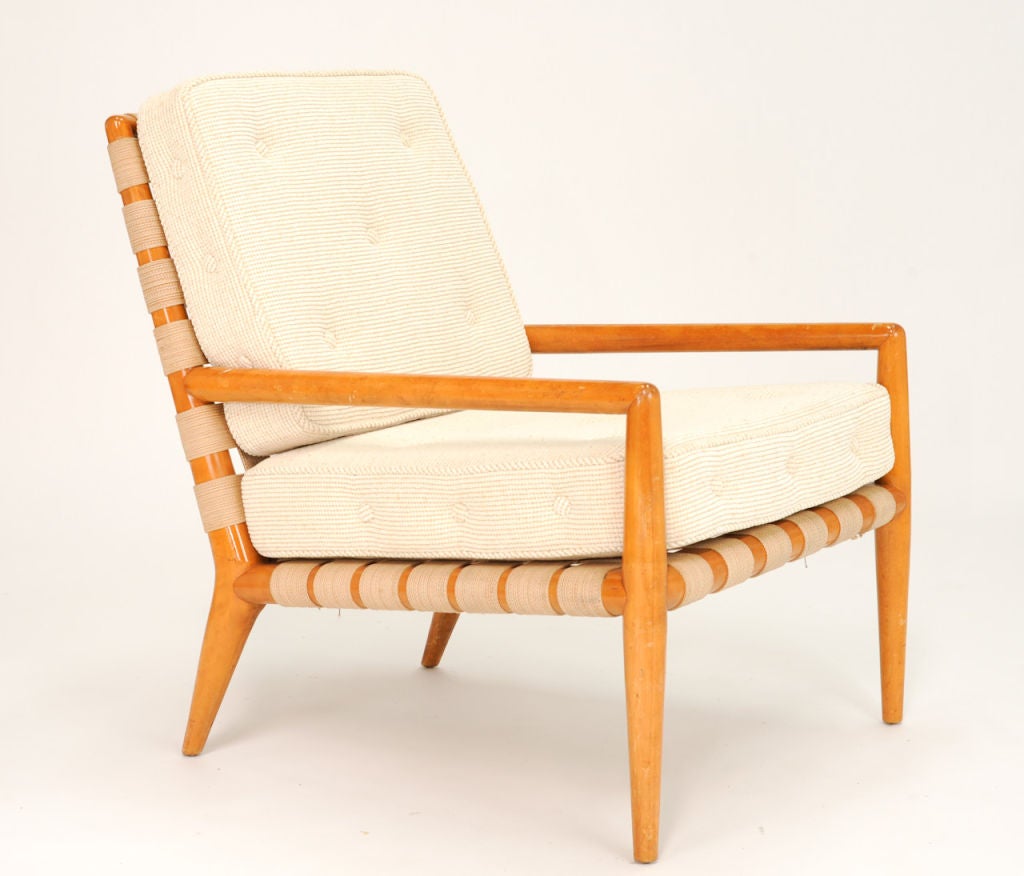 A single Gibbing's web strap chair for Widdicomb.  This is the second edition of the gibbings strap chair. Fabric is a white wool. Arm Height is 20.5