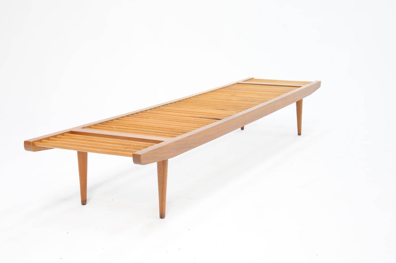 A wonderful example of a early Baughman design for Glen of California. The simple and elegant piece is flexible in that it can be used as a coffee table as well.