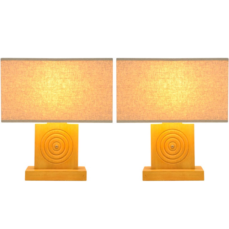 Handsome pair of Blond Bulleye Table Lamps For Sale
