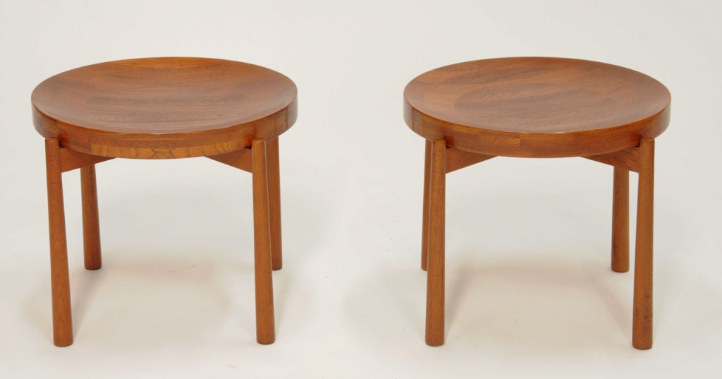 These wonderful table are a matching pair of tray tables design by Jens Quistgaard for Richard Nissen. The tops are two side and can be flipped to a flat top or concave. handsomely freshly refinished.
