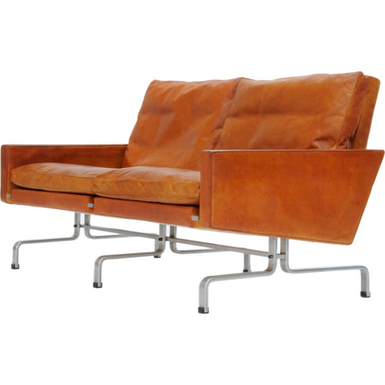 Poul Kjaerholm's Pk 31/2 loveseat for Fritz Hansen
