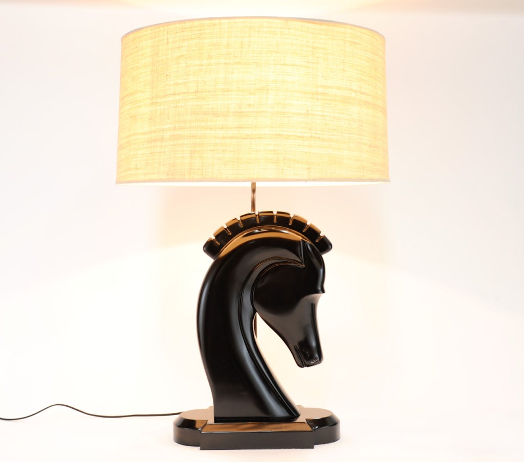 These opposing horse heads lamps are 24