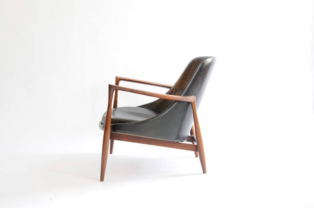 A Elizabeth chair by Ib Koford-Larsen in Rosewood.  The chair is untouch from it's original purchase.  The frame is a handsomley grained rosewood.
