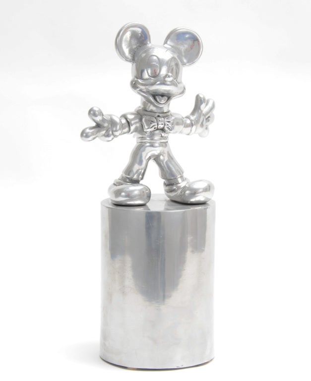 This rare and wonderful statue is handsome and a tongue in cheek of british witt by British artist Clive Barker.  The cartoon character is well sculpted in aluminum.  It is clearly marked with the artist name on the bottom and is early in the AP