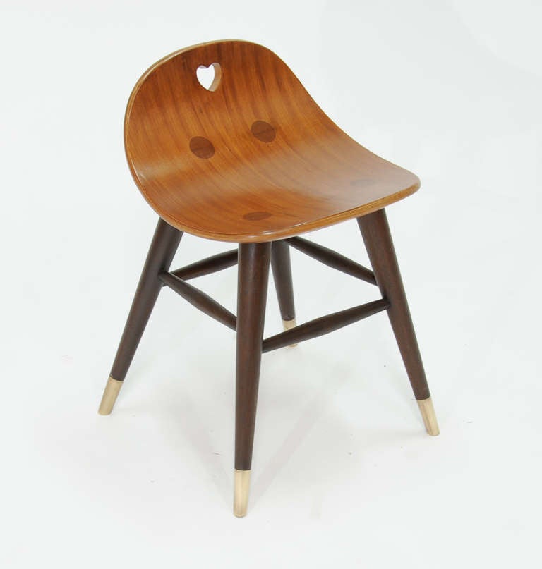 A green label Dunbar Heart Stool by Edward Wormley for Dunbar.  The exquisitely designed and made.  This stool feature brass sabows, mahogany legs and cherry seat. The stool has gone through a complete refinishing.  This stool is a one of a kind
