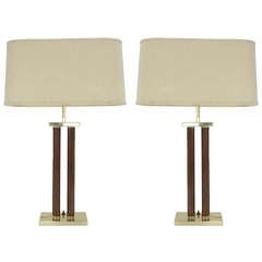 A Pair of Leather Wrapped Table Lamps in the Style of Jacques Adnet
