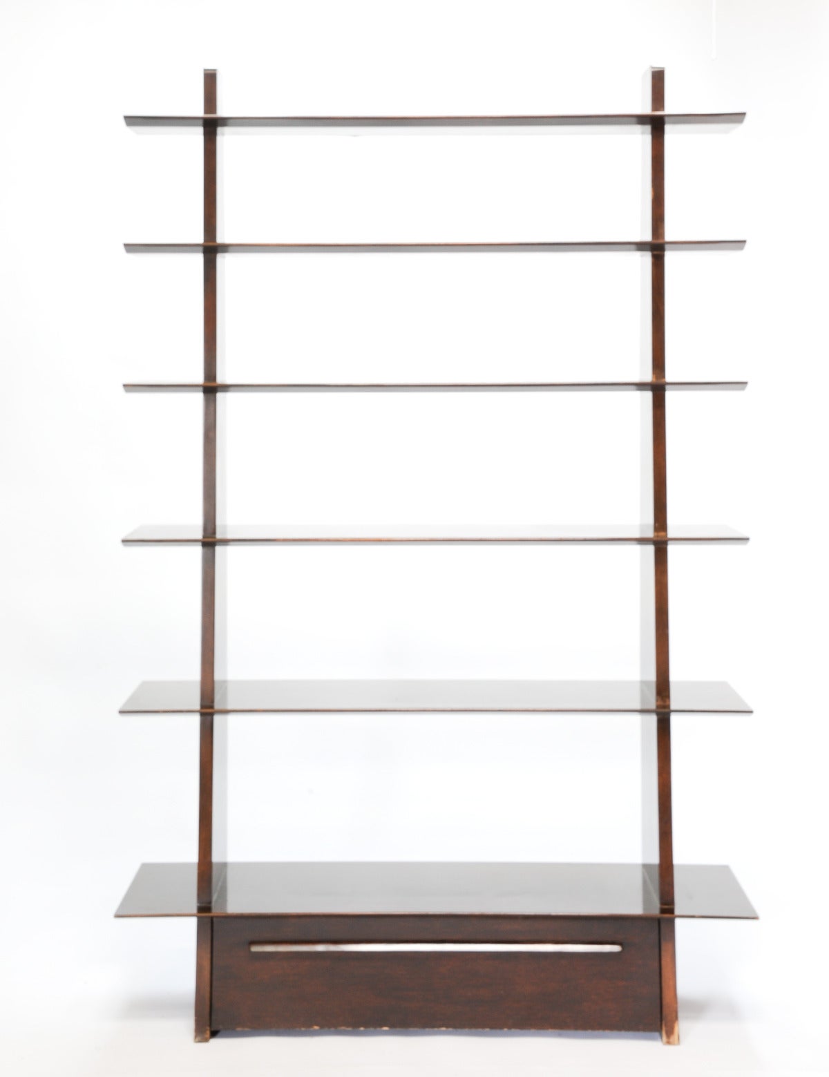 This is an early green label dunbar bookcase for Dunbar designered by Edward Wormley.  The green label Dunbar pieces are from the height of Wormley's design period and the refinement of the Swedish craftmanship of the Berne IN manufacturing.