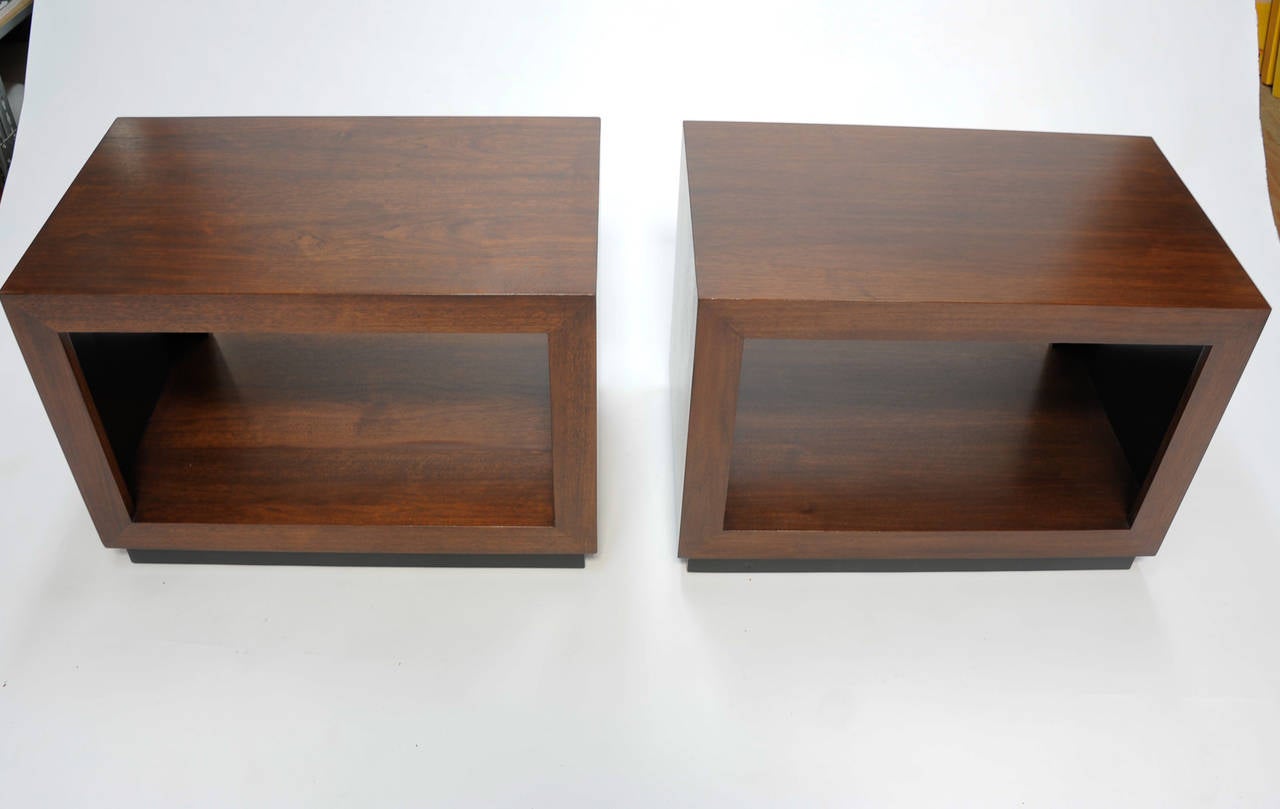 A wonderful set of Probber side tables that are grand in scale and simple in form. The elegance of the pair makes for beautiful bookends to any sofa or seating arrangement.
