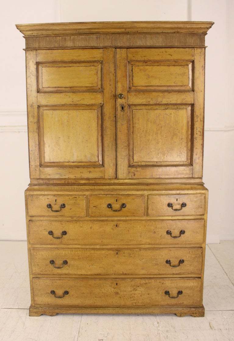 An excellent piece, museum quality, with very fine Georgian character, lovely raised panels, typical Scottish three over three drawers, very gracious shaped apron, Classic molding with hand-carved vertical reeding. In two parts for ease of moving.