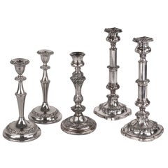 Collection of Two Pairs and One Single English Silver Plated Candlesticks