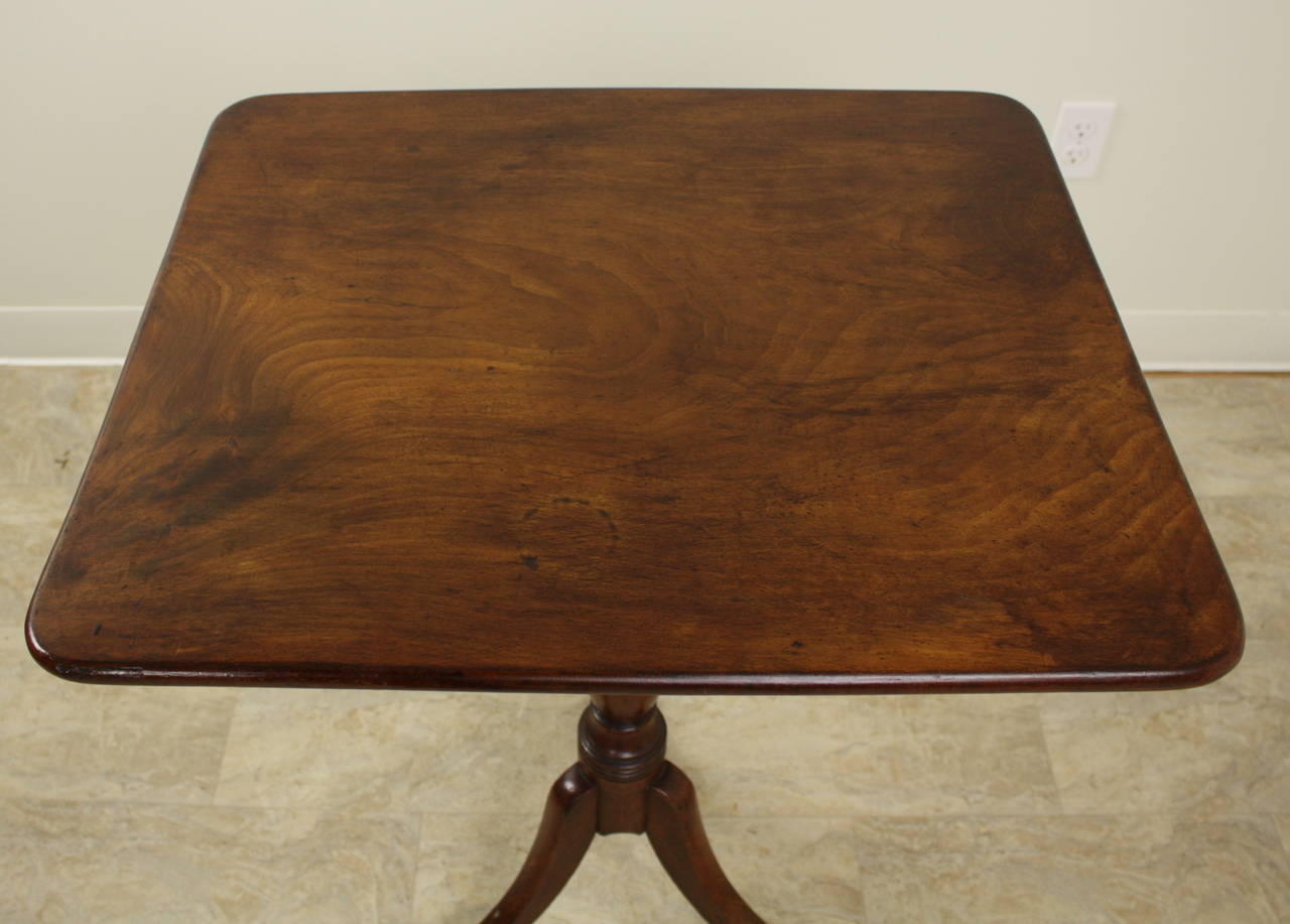 This is a beautiful one-board top pedestal table.  Color and grain are exceptional on this occasional table, also a good height for a lamp table.  Converted from the original tilt-top function.