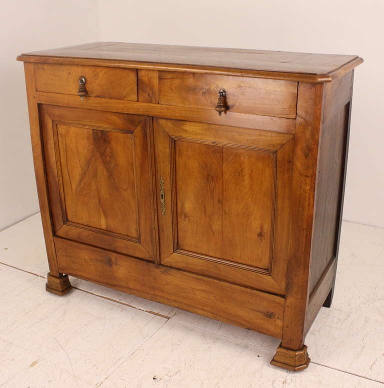 Very pretty, classic, Louis Philippe, buffet.  The cherry color is lovely, the mitered top very nice also,  Classic drop handles on the two drawers,  Quite a good size, not too deep..  
