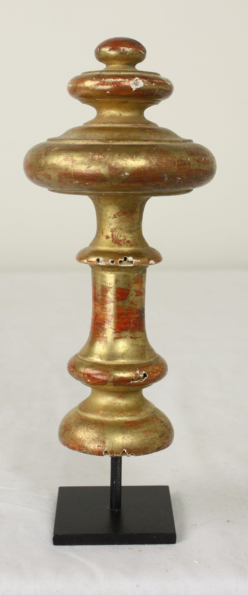 A collection of five gilded French finials, lovely decorations on new graceful hand-made stands.   There is some red base show-thru, common on gilded wood.  These are architecturally interesting, and shiny and pretty.  Very nice on a shelf or