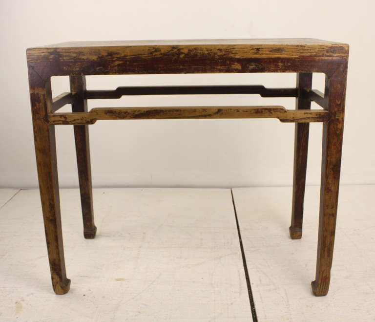 This is a simple, worn, Chinese antique piece that has considerable character. Good height makes this useful as a server, sofa table or a hall table.  Classic lines give a great silouette.