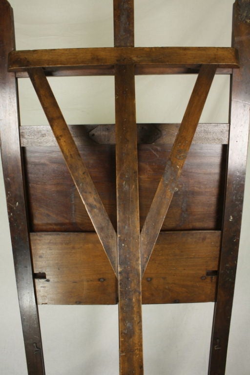 A beautiful 19th century mahogany campaign easel from Winsor and Newton, founded in 1832 and now in its 175th year of producing high quality fine art materials.  The easel is in top condition with original brass fittings and canvas-support tray.  A