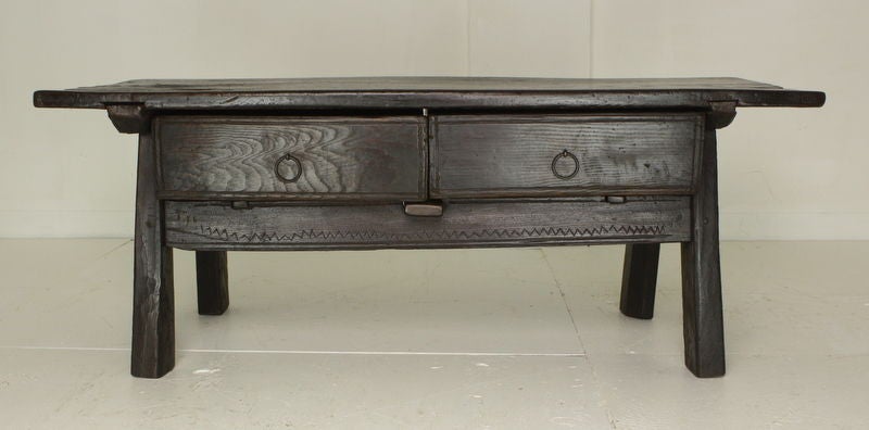 Very chunky old country French oak coffee table, two good-sized drawers.   Old wear provides a dramatic distressed look, lots of character. Top slides forward on runners. Sale, price is final.