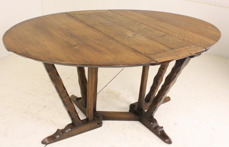 A superb example of Cotswold School furniture, developed in early 20th century, England. Romney Green, a leader of the movement, whose work is prized for craftsmanship and elegant simple lines, made the farm table using his typical chip-carving
