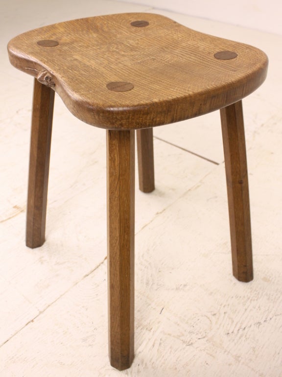 The carved mouse is the trademark of Robert Thompson, the well known craftsman from Kilburn in Yorkshire, England. Charming stool, very desirable 