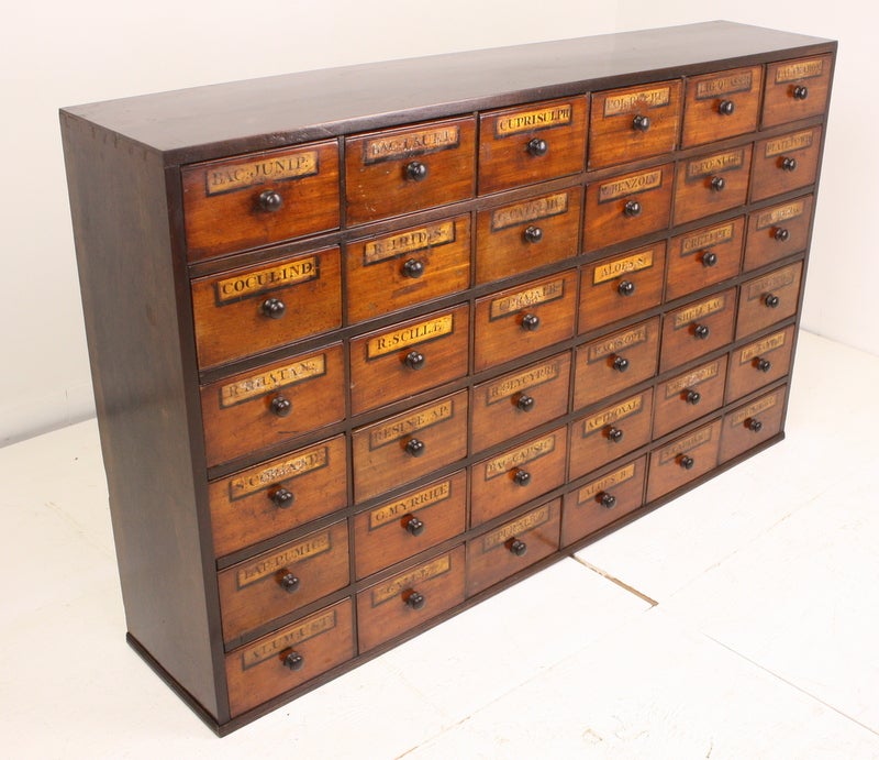 Stunning--the best ever.  It is an imposing size, at 4 1/2' wide, it is a very attention-getting bank of drawers.  The chest makes a terrific impression, with a glowing color, shiny gilt Latin medical labels, and could be placed anywhere in a fine