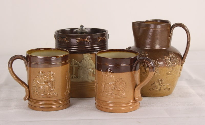 Charming collection of four pieces. The lidded pot is quite unique, the little knob on the top is worn silver plate. All pieces are in very good condition, there are no chips. Dimensions are for the lidded pot.