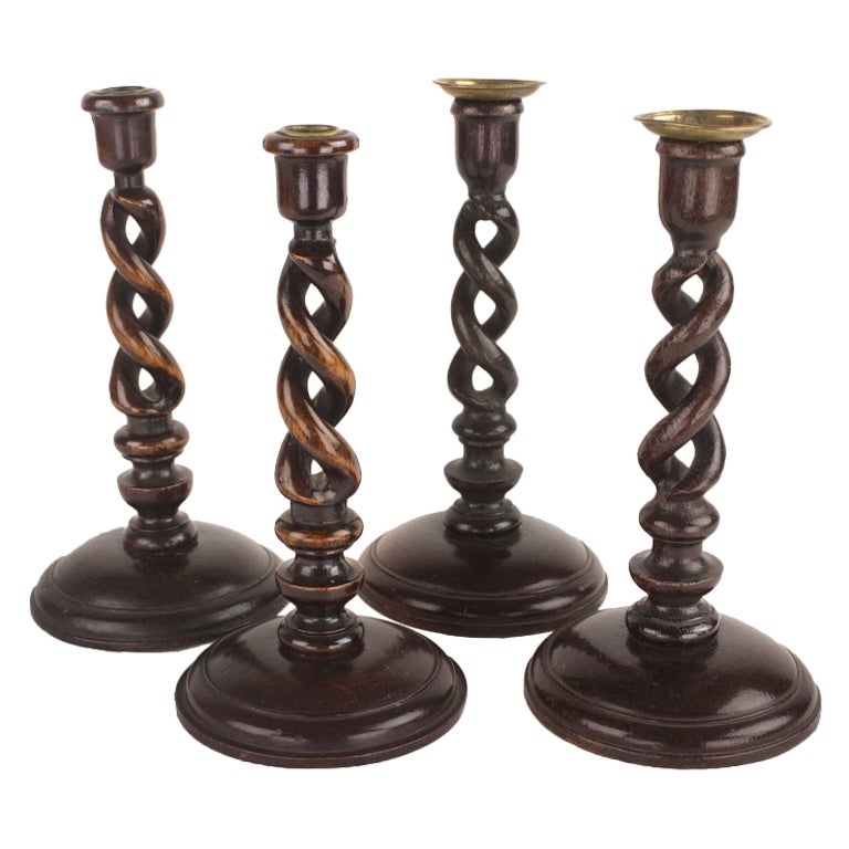 Two Pair of Antique Oak Open Barley Twist Candlesticks