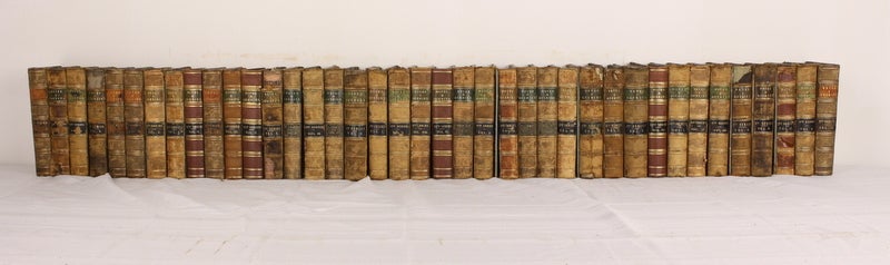 This collection of 41 books is a most interesting and well-used set, from the late 1800s. The former owner has annotated the volumes and used them as scrapbooks too! See thumbnails to find the newspaper cuttings-which are quite fun to read. Colorful