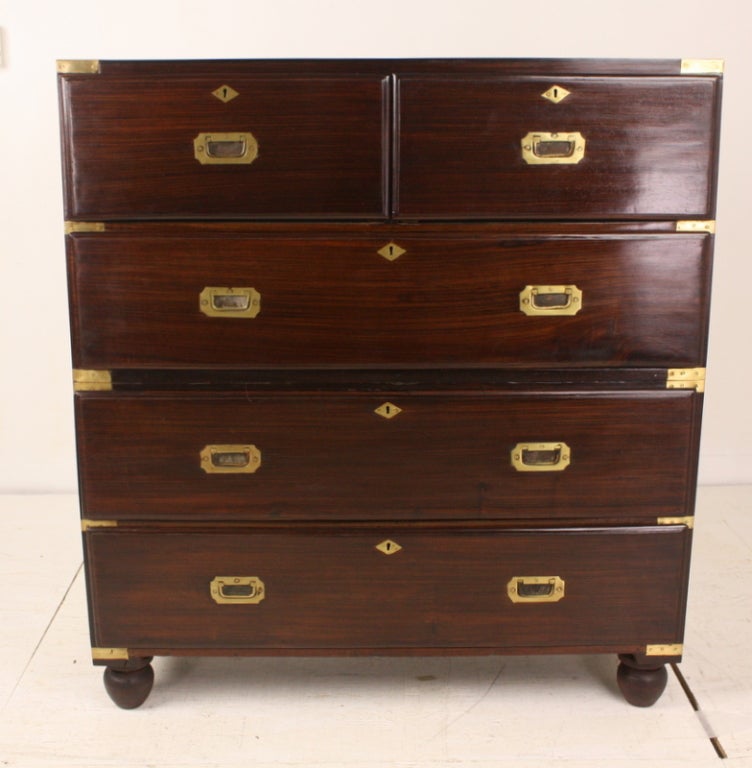 Stunning, rich and dramatic, man's bureau.  Classic two-piece, all the original brasses, Rosewood is the ideal campaign chest wood, very strong, very elegant.  Drawers slide well, clean and very fine.