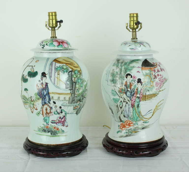 Handpainted PAIR of lovely ginger jars, now wired for US. These are as close to a pair as one can find, very slight and not noticeable differences in measurement.  These look lovely with pale silk shades that pick up one of the pastel colors in the