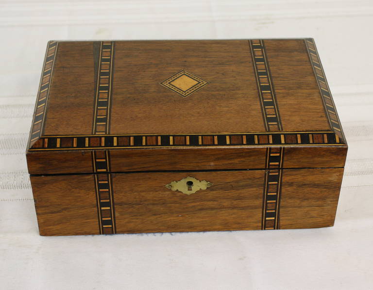 Paper Collection of Seven Multiwood Inlaid Wooden Boxes