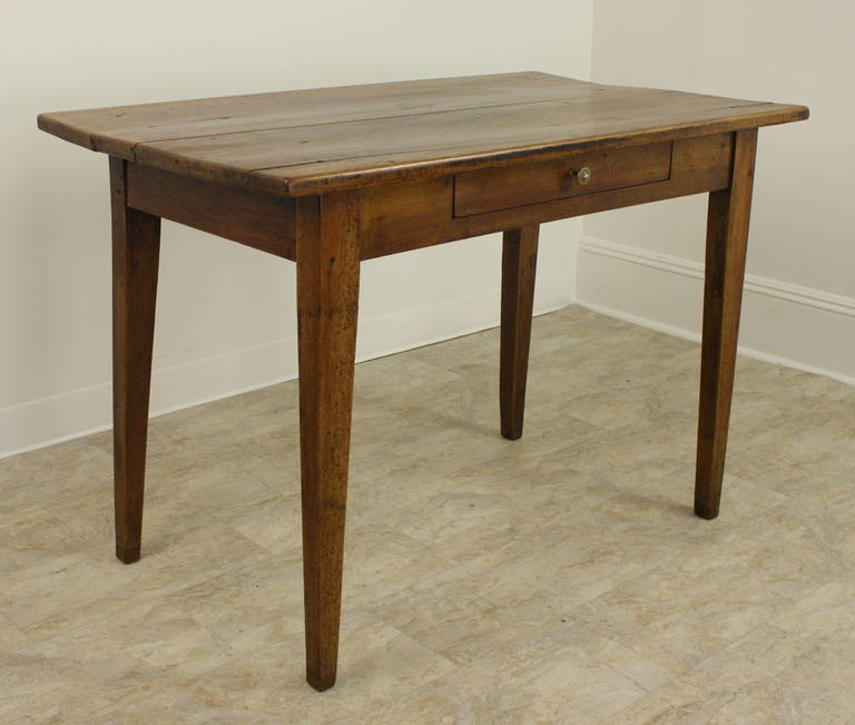 A very nice desk, close to four feet in width, standard height, with an excellent apron height--very comfortable at 24 3/4