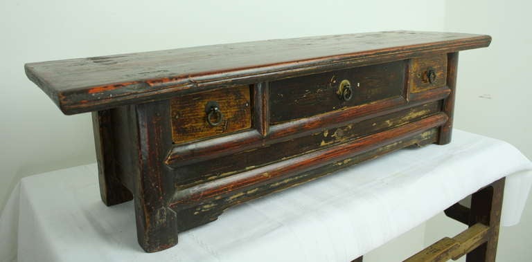 Quite cute, wonderful distress to the old paint. Useful small drawers. At only 11